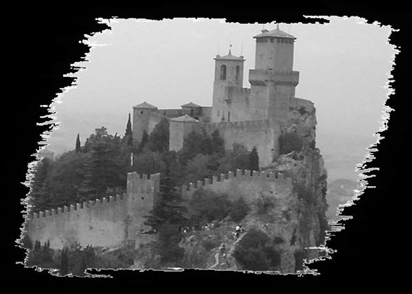 The Guaita tower of San Marino on a rocky cliff, black and white photo