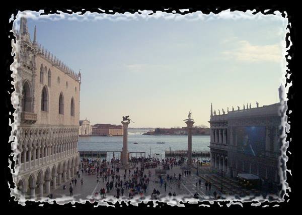 Piazzetta San Marco in Venice: Doge's Palace, columns, crowd and lagoon
