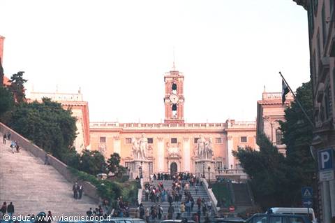 Piazza del Campidoglio in Rome, tourists on the steps at dusk