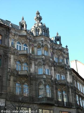 Art Nouveau facade with statues and spires in Budapest, morning light