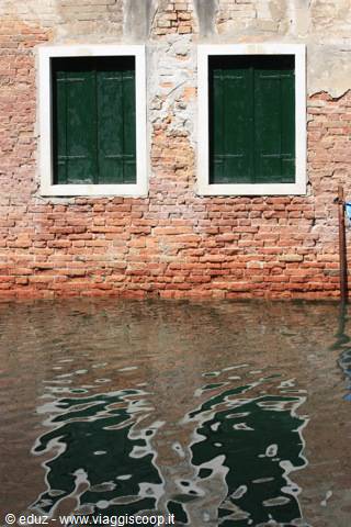 Venetian blinds on the Canals