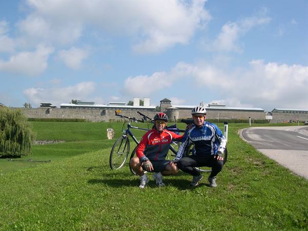 IN THE BACKGROUND THE MAUTHAUSEN CONCENTRATION CAMP