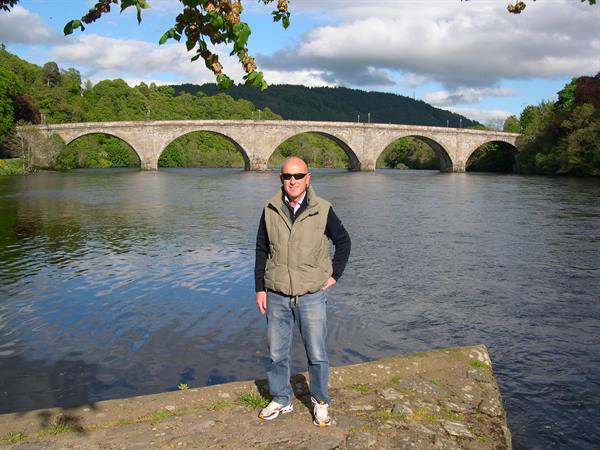 DAD WITH DUNKELD BRIDGE IN THE BACKGROUND