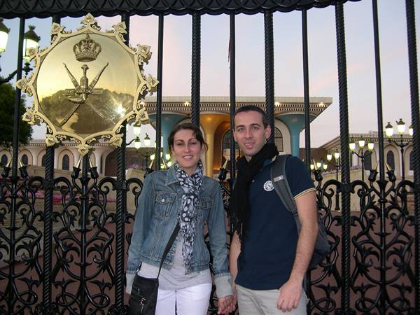 IN THE BACKGROUND THE COAT OF ARMS OF THE SULTANATE
