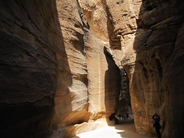 like dwarfs in the Siq of Petra