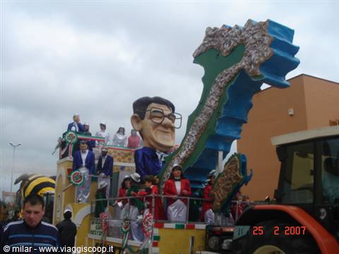 Carnival float with Italy-shaped figure and costumed people