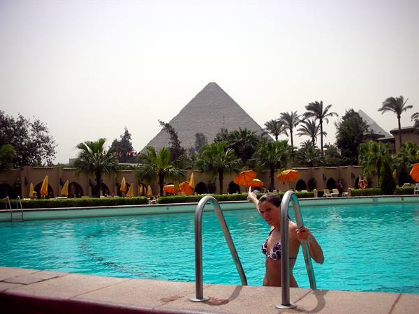 the Oberoi pool with a pyramid view
