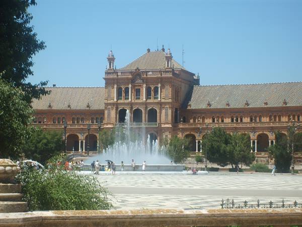 Fountain in front of the brick pavilion of Plaza de España, Seville