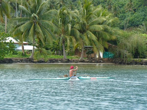 Outrigger canoe along the coast of Tahaa