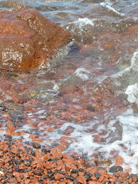 The pebbles of the red beach