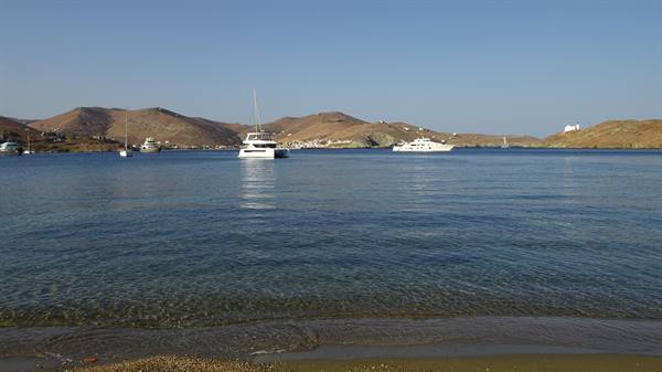 Calm waters, boats cradling the memory of a perfect day.