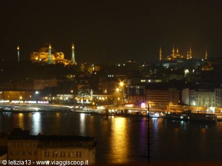 Night in Istanbul: Hagia Sophia and illuminated mosques reflected on the Golden Horn