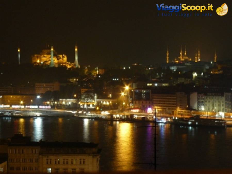 Night in Istanbul: Hagia Sophia and illuminated mosques reflected on the Golden Horn