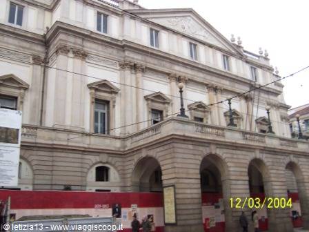 Teatro alla Scala in Milan, neoclassical facade with arches under grey light