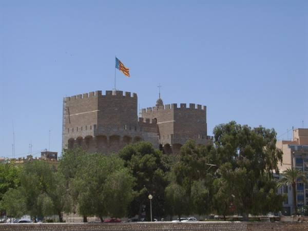 The Serrano Towers in Valencia, medieval stone walls with flag flying