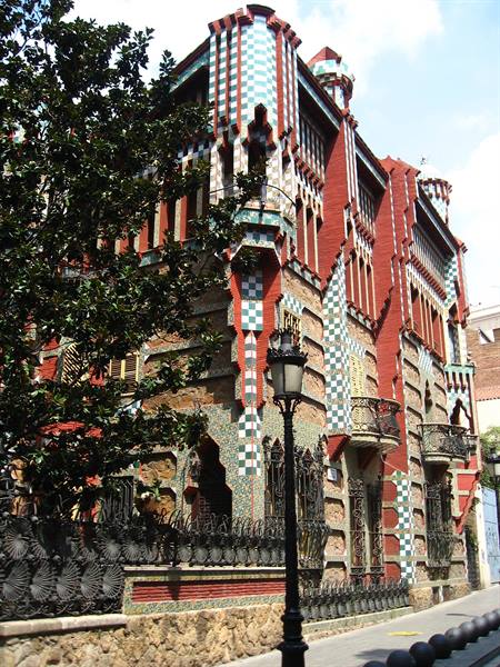 Gaudí's Casa Vicens in Barcelona, checkered ceramic façade under sunny light