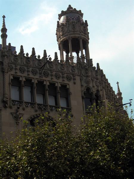 Casa Lleó Morera in Barcelona, modernist stone facade with spires and turret