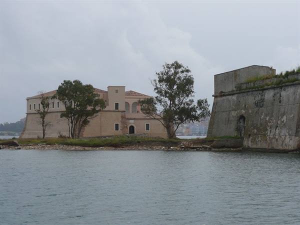 Islet with old fortified building beside the walls of Corfu fortress