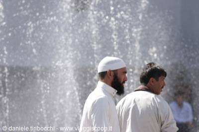 MAN IN FRONT OF THE FOUNTAIN