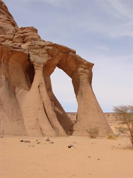 Sandstone natural arch carved by wind in the Tassili desert