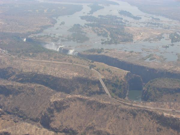 Aerial view of Victoria Falls, the Zambezi river plunging into the rocky gorge