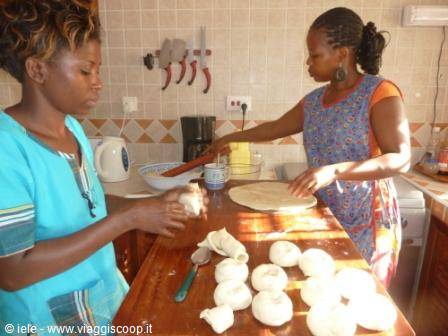 ...Tatu and Silvia prepare the chapati....