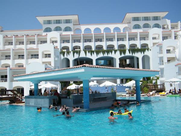 main pool and bar, with a view of the resort