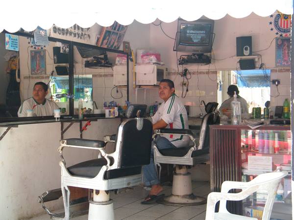 the barber waits for customers