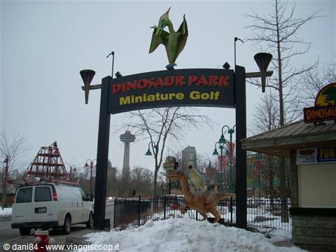 Dinosaur Park miniature golf entrance at Niagara Falls, snow and parked van