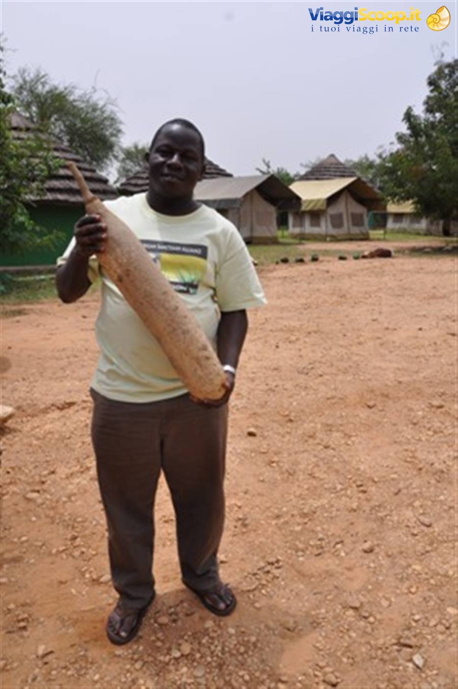 Joel at the red Chilli camp with the seed of the sausage tree