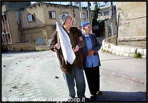 Elderly Jewish couple walking arm in arm on a Jerusalem street