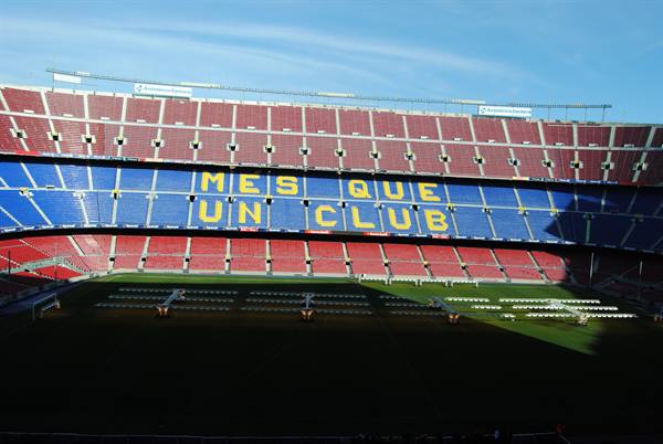 Camp Nou stand with blue and red mosaic reading Més que un Club