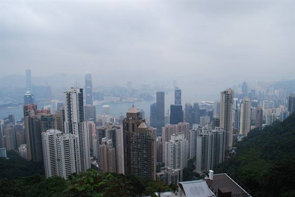 Hong Kong skyscrapers in the haze from Victoria Peak, grey sky
