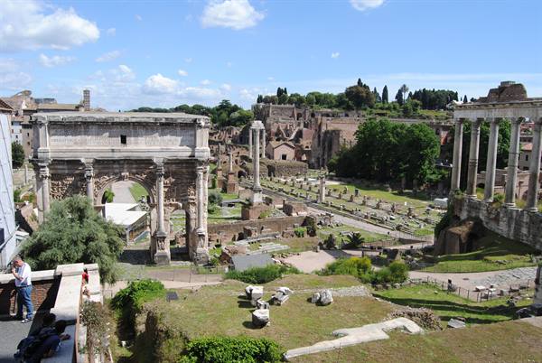 Arch of Septimius Severus and columns among the Roman Forum ruins
