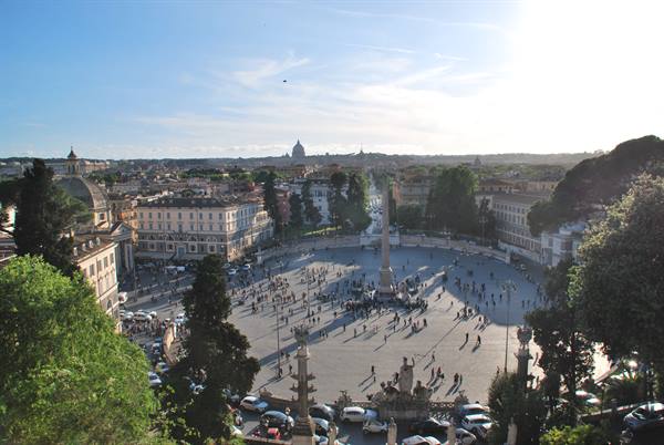 Piazza del Popolo in Rome, crowds around the Egyptian obelisk in afternoon light
