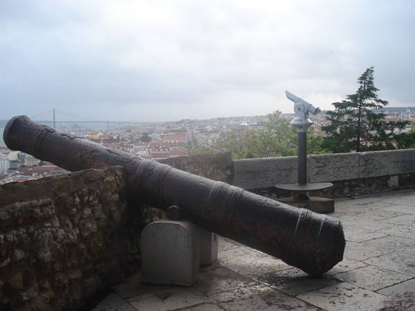 Old iron cannon on the walls of São Jorge Castle, Lisbon