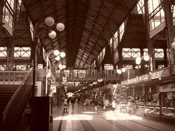 Iron framework of Budapest's Great Market Hall, lamps and food stalls