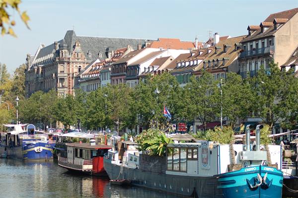 Strasbourg quays: houseboats moored along the canal under historic facades