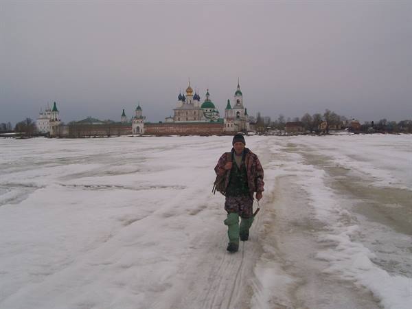 Rostov Veliky, fisherman on the Lake with Monastery