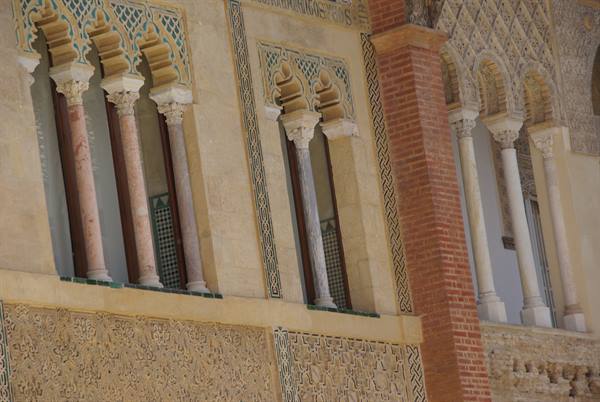 Marble columns and decorated arches of the Aljafería palace, in Zaragoza