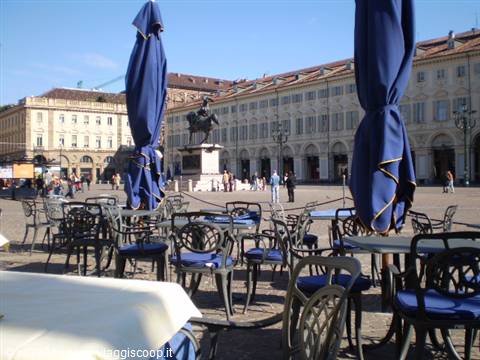 Piazza San Carlo in Turin, folded café tables before the equestrian statue