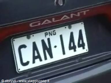 PNG license plate on a Mitsubishi Galant, daylight