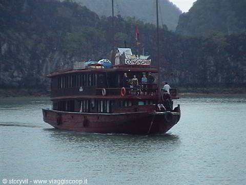 Tourists on the deck of an old wooden boat, Ha Long