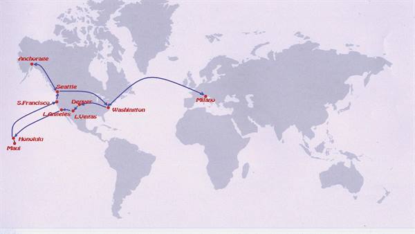 World map with blue route line from Milan to American cities