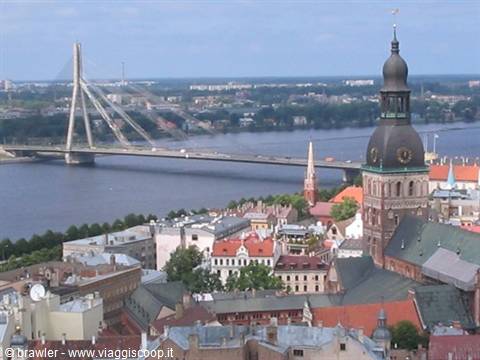 Riga: the bridge over the Daugava and the cathedral tower above rooftops