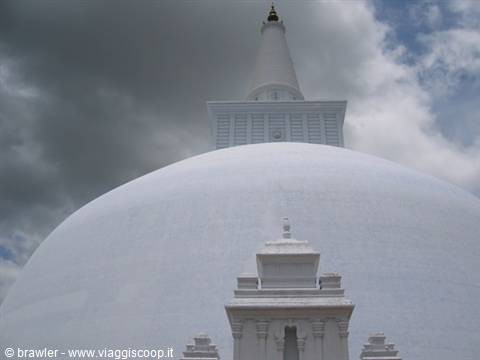 White Ruwanwelisaya stupa in Anuradhapura beneath grey clouds