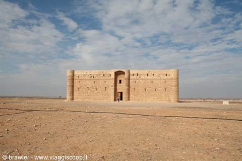 Qasr Kharana, limestone desert castle under a cloudy sky