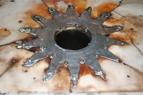 Fourteen-pointed silver star set in marble in the Nativity Church, Bethlehem