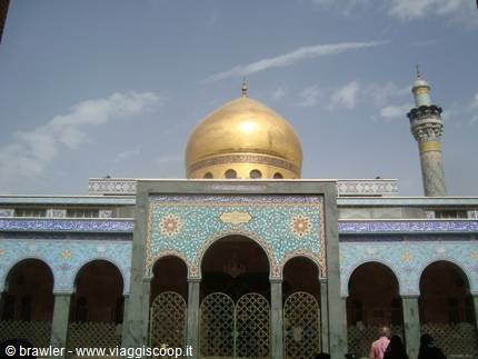 Sayyida Zaynab shrine: golden dome, minaret and courtyard with blue tiles