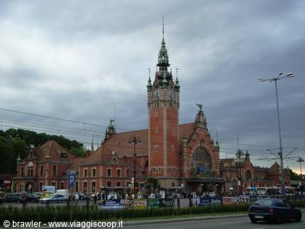 Red brick railway station with clock tower, Gdańsk Główny